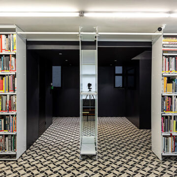 Crafting Spatial Harmony: Office & Library Space GB65 by Metro Arquitetos Associados